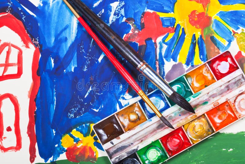 Watercolor set and two brushes on children picture stock photography