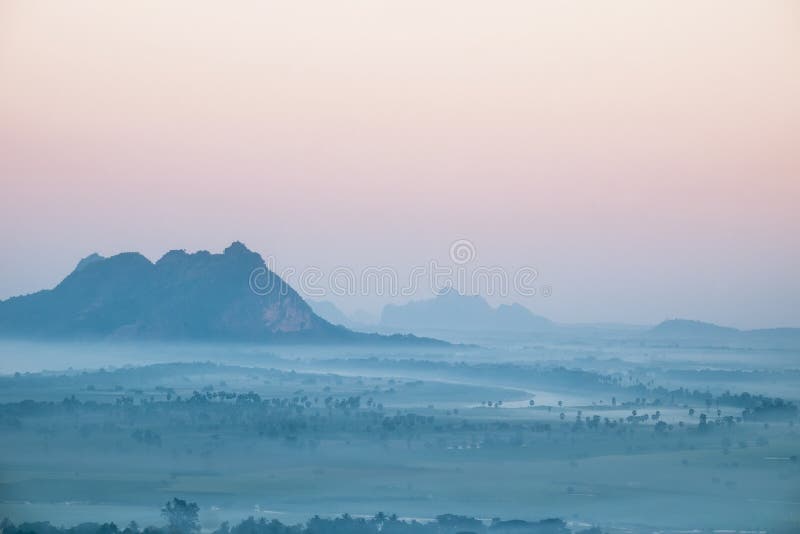 Watercolor view of foggy morning landscape. Hpa An, Myanmar (Burma)