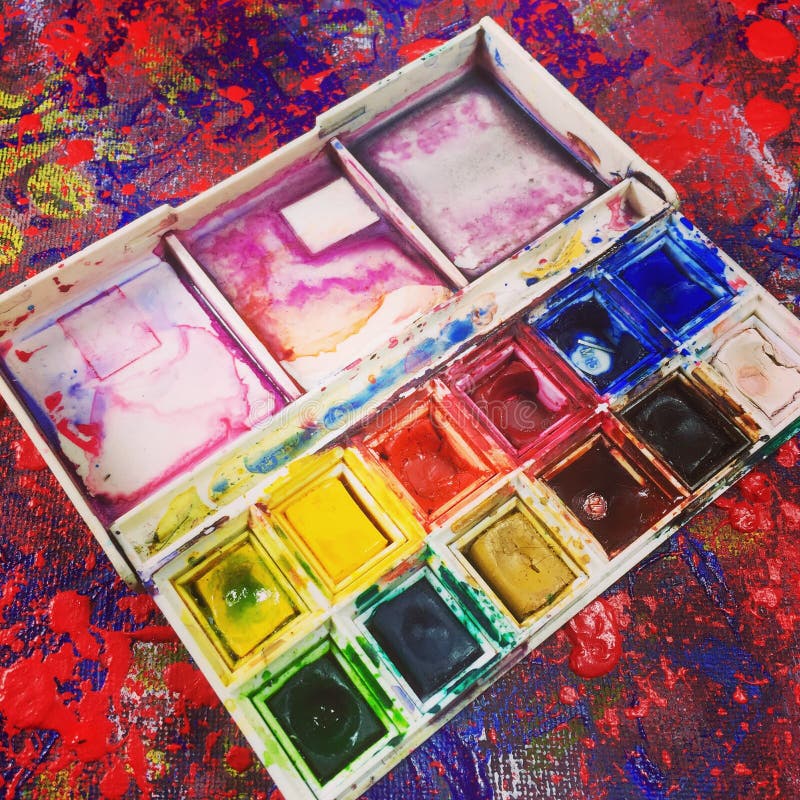 Watercolour paint palette stock image. Image of messy 72525345