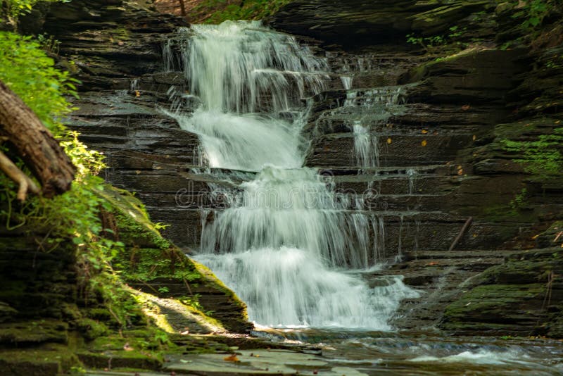Waterfall cascading on the creek stock images Waterfall cascading on the creek stock images