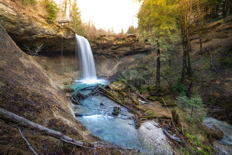 Waterfall at mountain river in spring stock photo Waterfall at mountain river in spring stock photo
