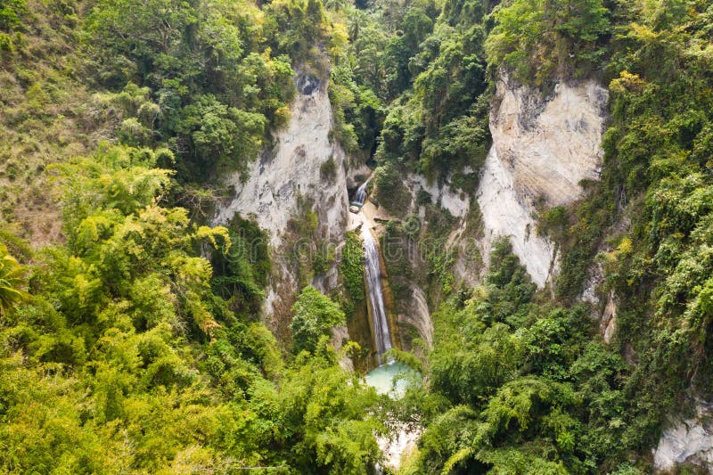 Waterfall in the rainforest jungle from above. Tropical Dao waterfalls in mountain jungle. Philippines, Cebu stock images Waterfall in the rainforest jungle from above. Tropical Dao waterfalls in mountain jungle. Philippines, Cebu stock images