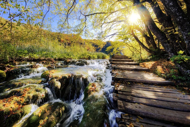 Waterfalls and pontoon in the sunshine in Plitvice National Park royalty free stock photography Waterfalls and pontoon in the sunshine in Plitvice National Park royalty free stock photography