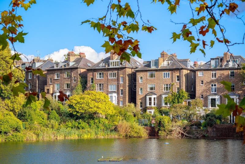 Reflection of House in Puddle Stock Photo Image of alley, mirroring