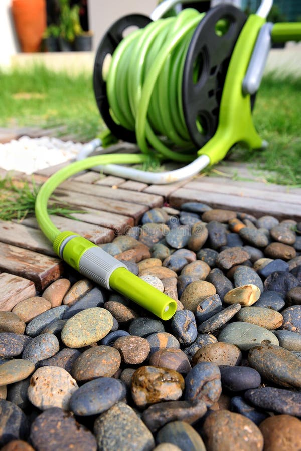 Watering garden hose stock photo. Image of shower, hose 42239846