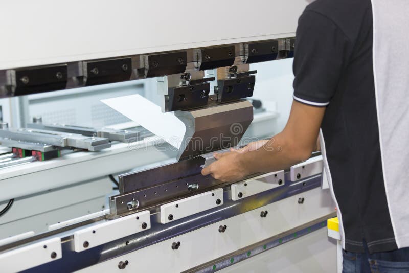 Waterjet metal cutting by cnc program stock images