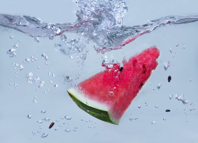 Watermelon droiping in water