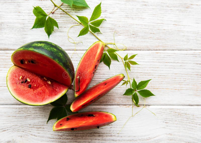 Watermelon with Green Leaves Stock Photo Image of ripe, organic