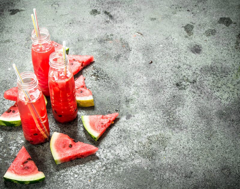 Watermelon Juice in Bottles with Straws. Stock Photo Image of glass