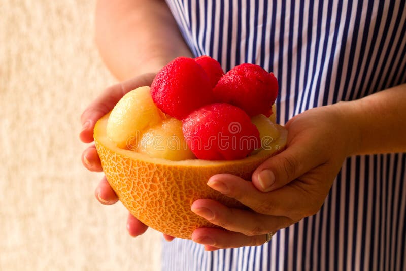 Watermelon and melon balls stock photo. Image of hand 121024868