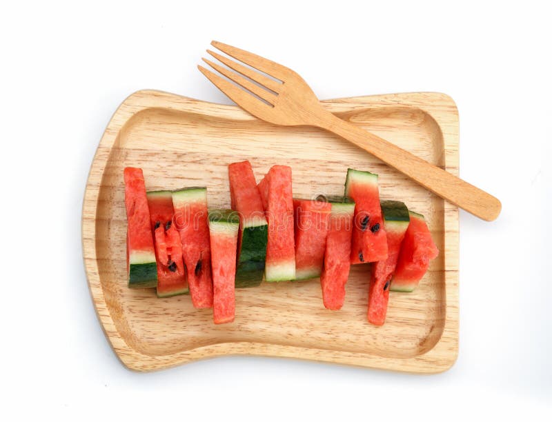 Watermelon slices in wooden plate. stock images Watermelon slices in wooden plate. stock images