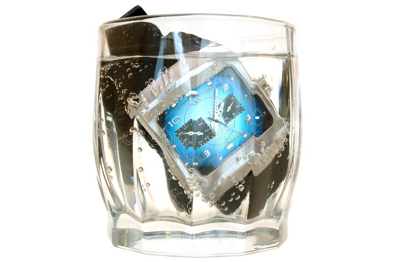 Waterproof watch in glass with water.