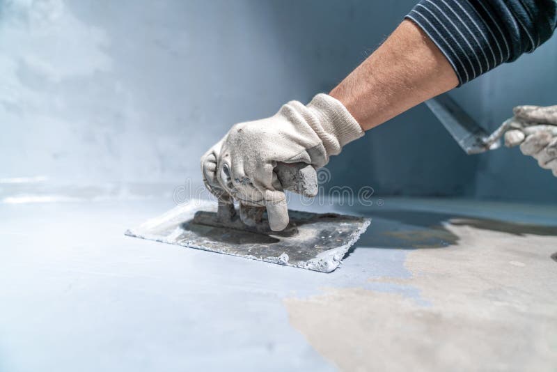 Waterproofing of the Bathroom Floor in a New Building Stock Photo