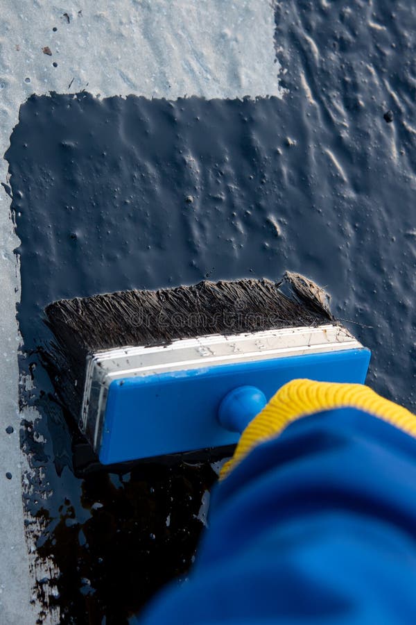 Worker Applies Bitumen Mastic on the Foundation Stock Image Image of