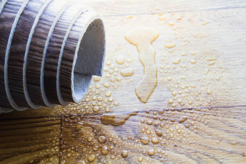 Waterproofness of linoleum. Waterproof linoleum in the kitchen. Sample roll royalty free stock photography