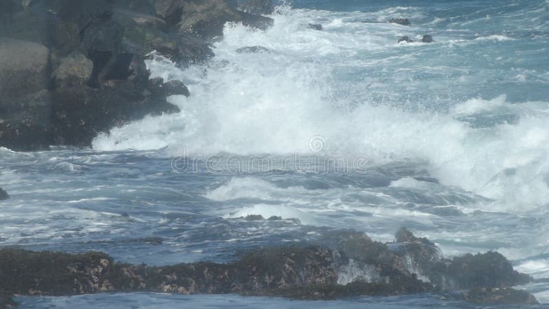 Waters Rushing to Paint a Picture of Nature`s Fury. The rushing waters along the shores of the beaches of San Juan create a picture of immense beauty. The waters royalty free stock images Waters Rushing to Paint a Picture of Nature`s Fury. The rushing waters along the shores of the beaches of San Juan create a picture of immense beauty. The waters royalty free stock images
