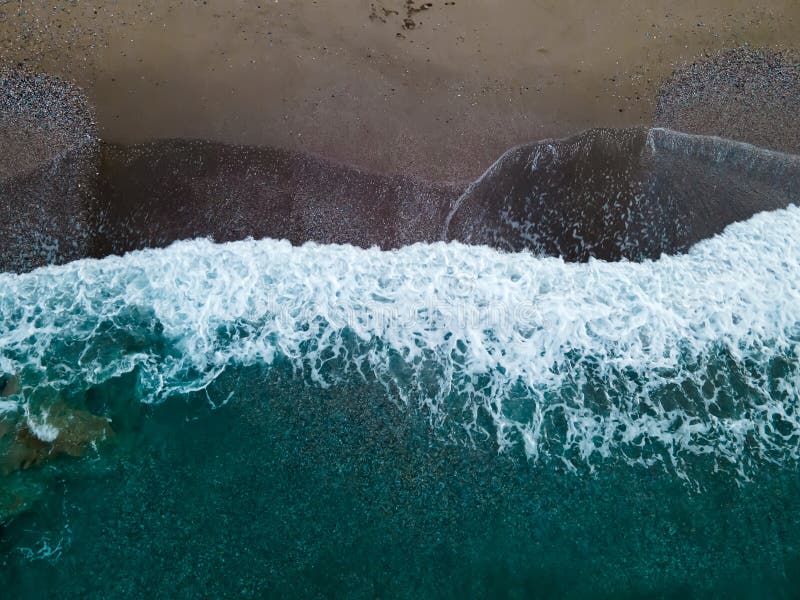 Mediterranean wave and sandy coast from above royalty free stock image