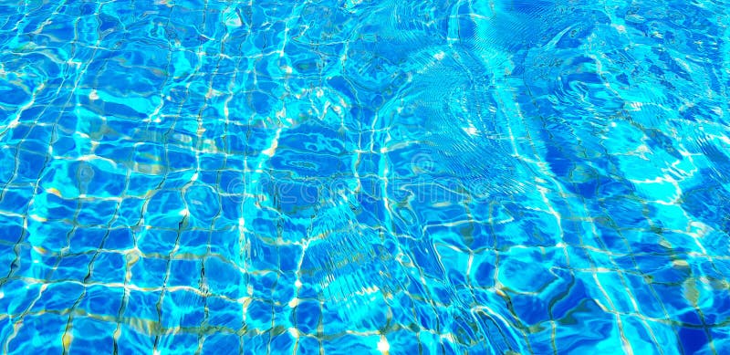 Wave Or Ripple Water In Swimming Pool With Sunlight Reflection For