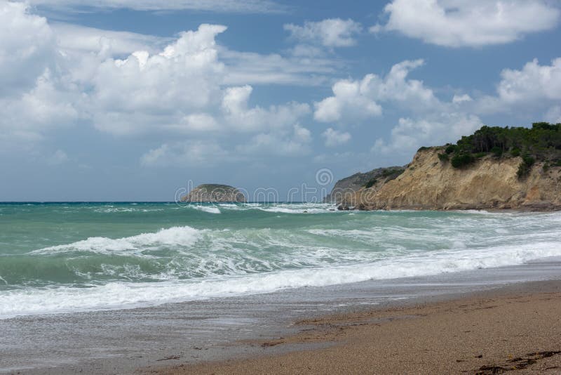 Waves in a bay of the Aegean Sea in Rhodes stock images Waves in a bay of the Aegean Sea in Rhodes stock images