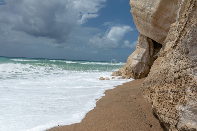 Waves in a bay of the Aegean Sea in Rhodes royalty free stock photography Waves in a bay of the Aegean Sea in Rhodes royalty free stock photography