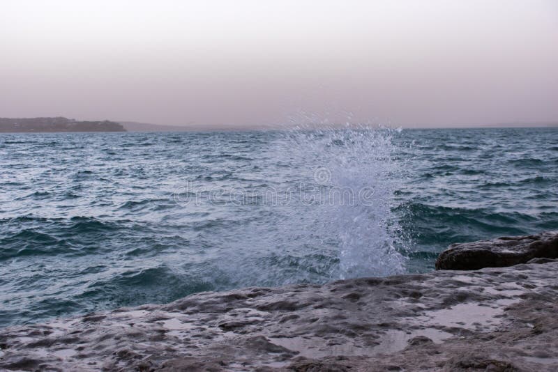 Waves crashing against shore at Canyon Lake, Texas