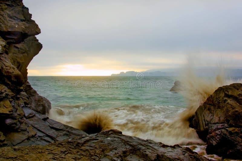 Waves hitting against rocks