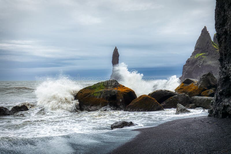 Waves hitting the black sand beach at reynisfjara on iceland royalty free stock images Waves hitting the black sand beach at reynisfjara on iceland royalty free stock images