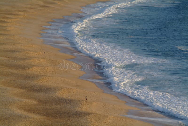 Waves in sand beach