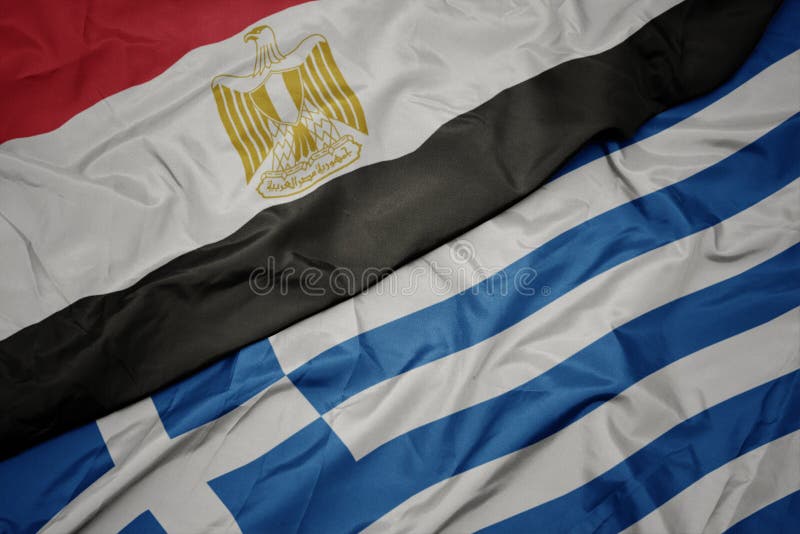 Waving colorful flag of greece and national flag of egypt royalty free stock photo