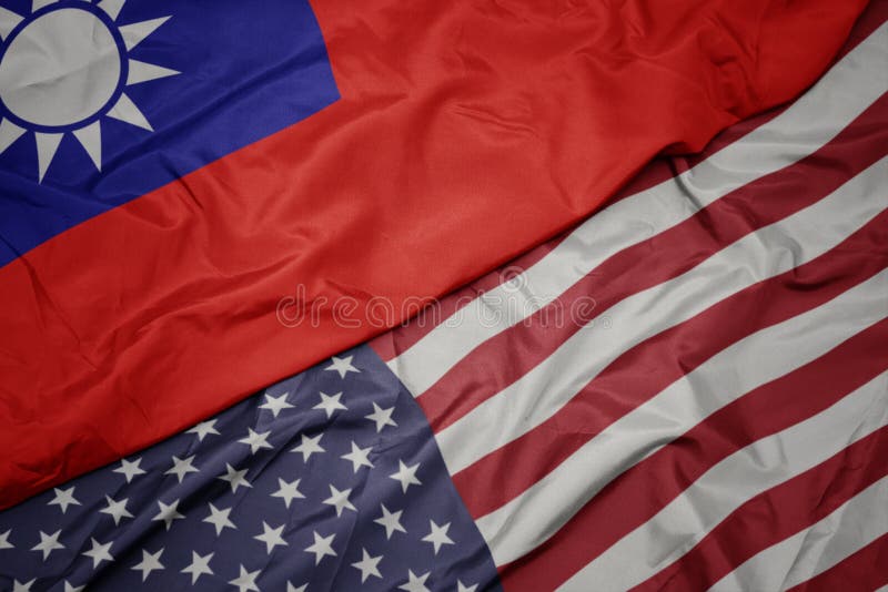 Waving colorful flag of united states of america and national flag of taiwan