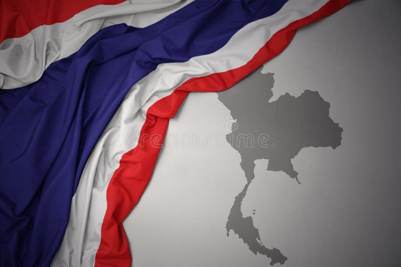 Waving colorful national flag and map of thailand.