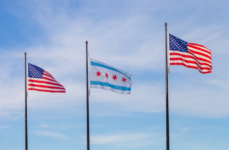 Waving flags of the United States and the city of Chicago with s