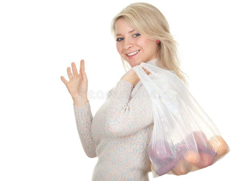 Waving hello woman with plastic shopping bag stock photo Waving hello woman with plastic shopping bag stock photo
