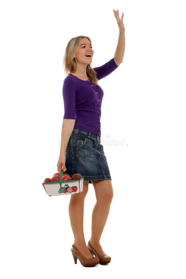 Waving to friends while shopping