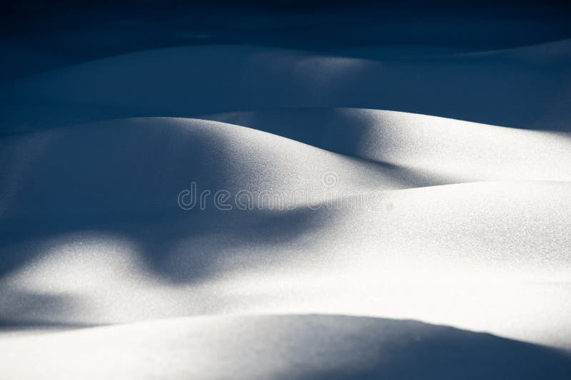Wavy snow dune texture stock photography