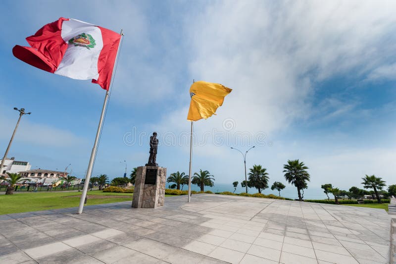 Wawing Peru Flag on the Coast of South Pacific Ocean Stock Image