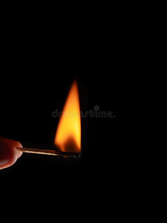 Wax Candle with Burning Wick and Smoke, Isolated on a Black Background