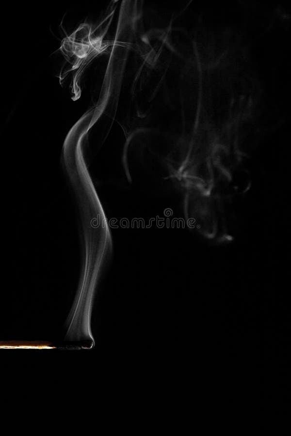 Wax Candle with Burning Wick and Smoke, Isolated on a Black Background