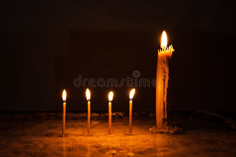 Wax church candles burning stock photo. Image of burning 89790944