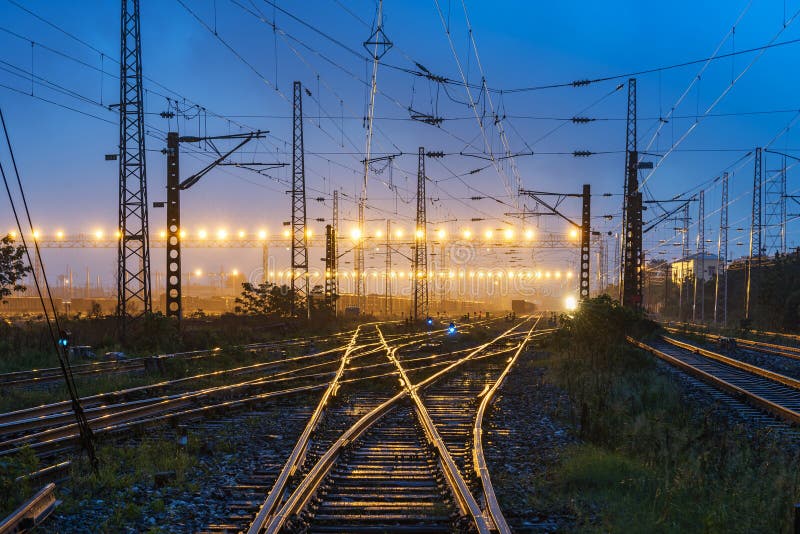 The way forward railway in dusk royalty free stock photo