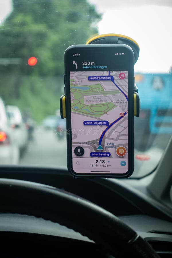 Waze apps. An iPhone X with Waze navigation app inside the car. Waze has gain popularity for its good navigation