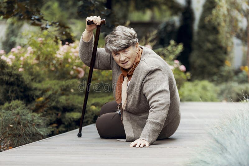 Weak Woman with Walking Stick Waiting for Help after Breathlessness