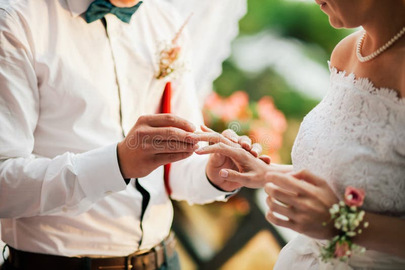 Wedding Rings on Ceremony at Church. Macro. Stock Photo - Image of cross, jewelery: 103340752