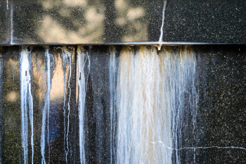 Weather Leaks on Black Granite Polished Wall