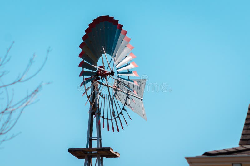 Weather vane blowing in the wind at the Michigan farm garden at the Frederik Meijer Gardens