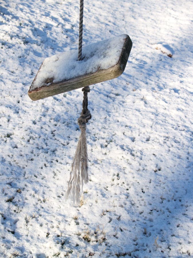 Weatherbeaten Swing in Snow