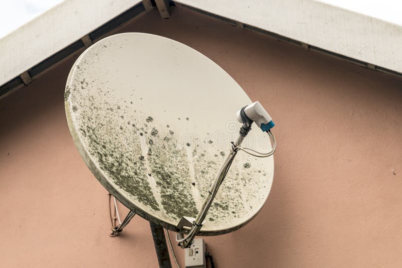 Weathered White Airconditioning Unit Mounted on Exterior Home Wa Stock