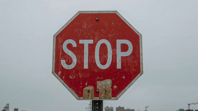 Weathered Red Octagonal Stop Sign with Urban Skyline royalty free illustration