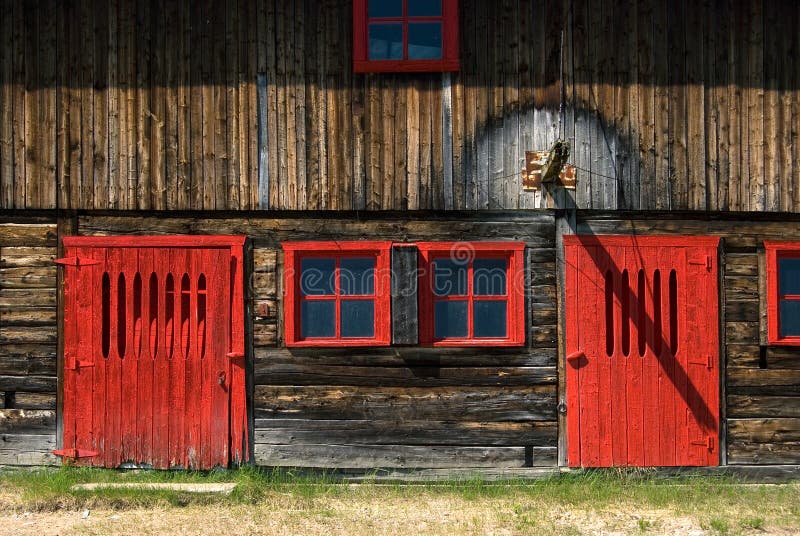 Weathered Red Windows and Door on a Barn