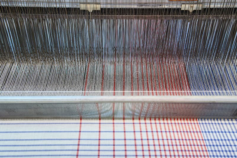 Industrial loom operating stock image